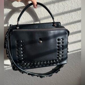 Dotcom leather whipstich bag wirh floral appliqué strap